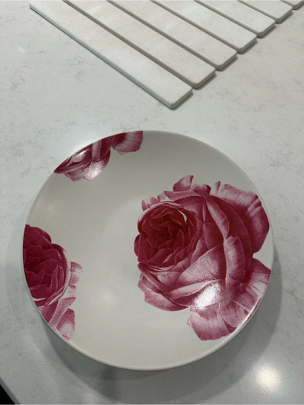 Gibson plate with pink rose motif, 11 inches x 2 inches tall